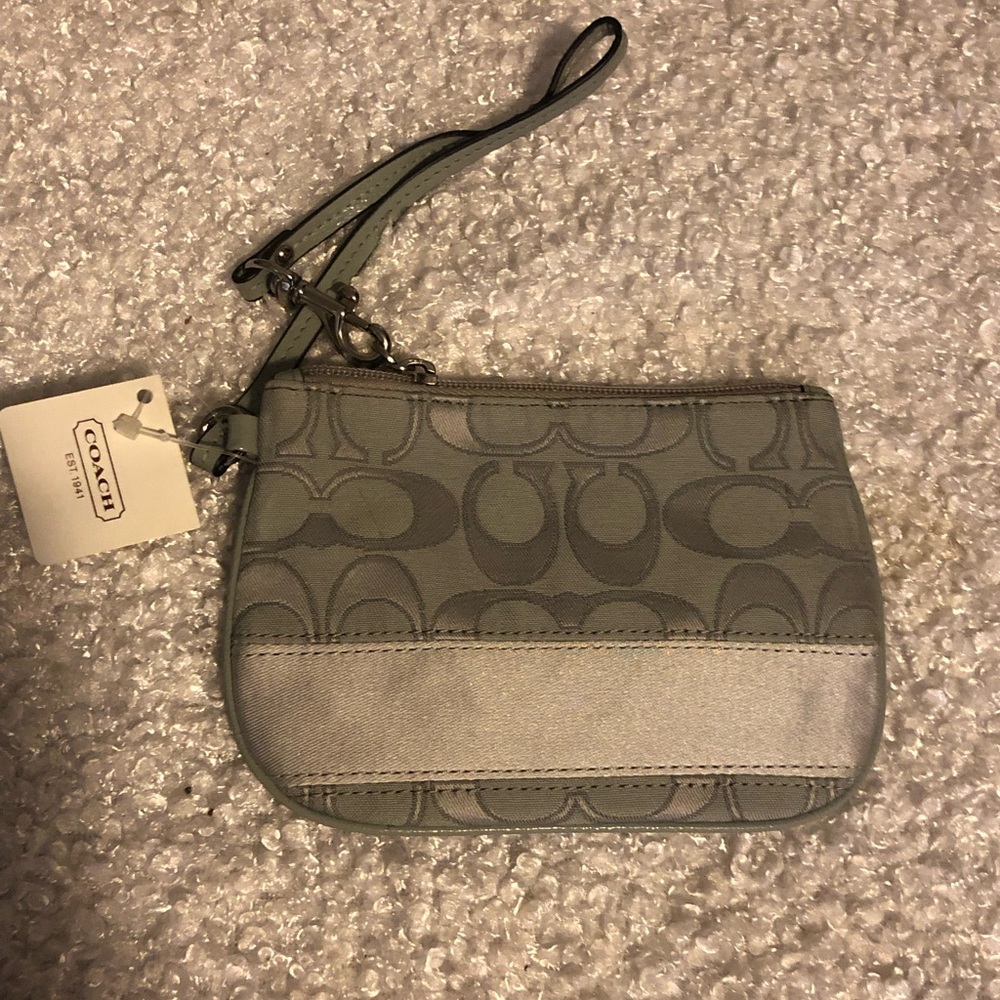 COACH NWT shown during live sale